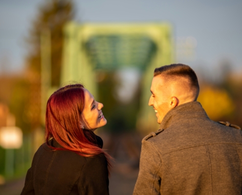 man and woman smiling