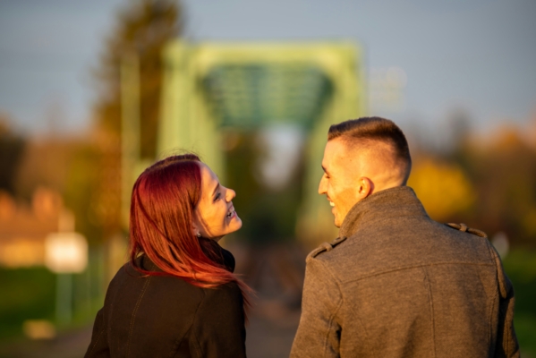 man and woman smiling